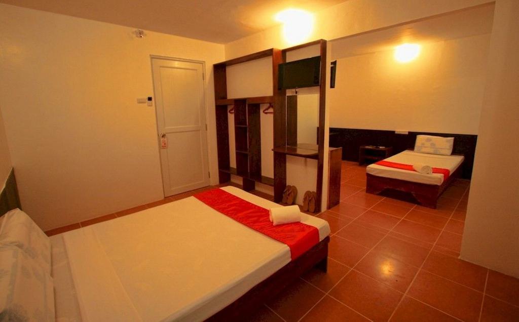 Dapitan Travelbee Heritage Inn חדר תמונה