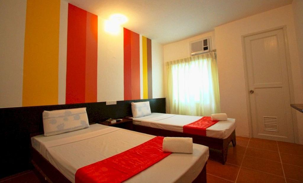 Dapitan Travelbee Heritage Inn חדר תמונה